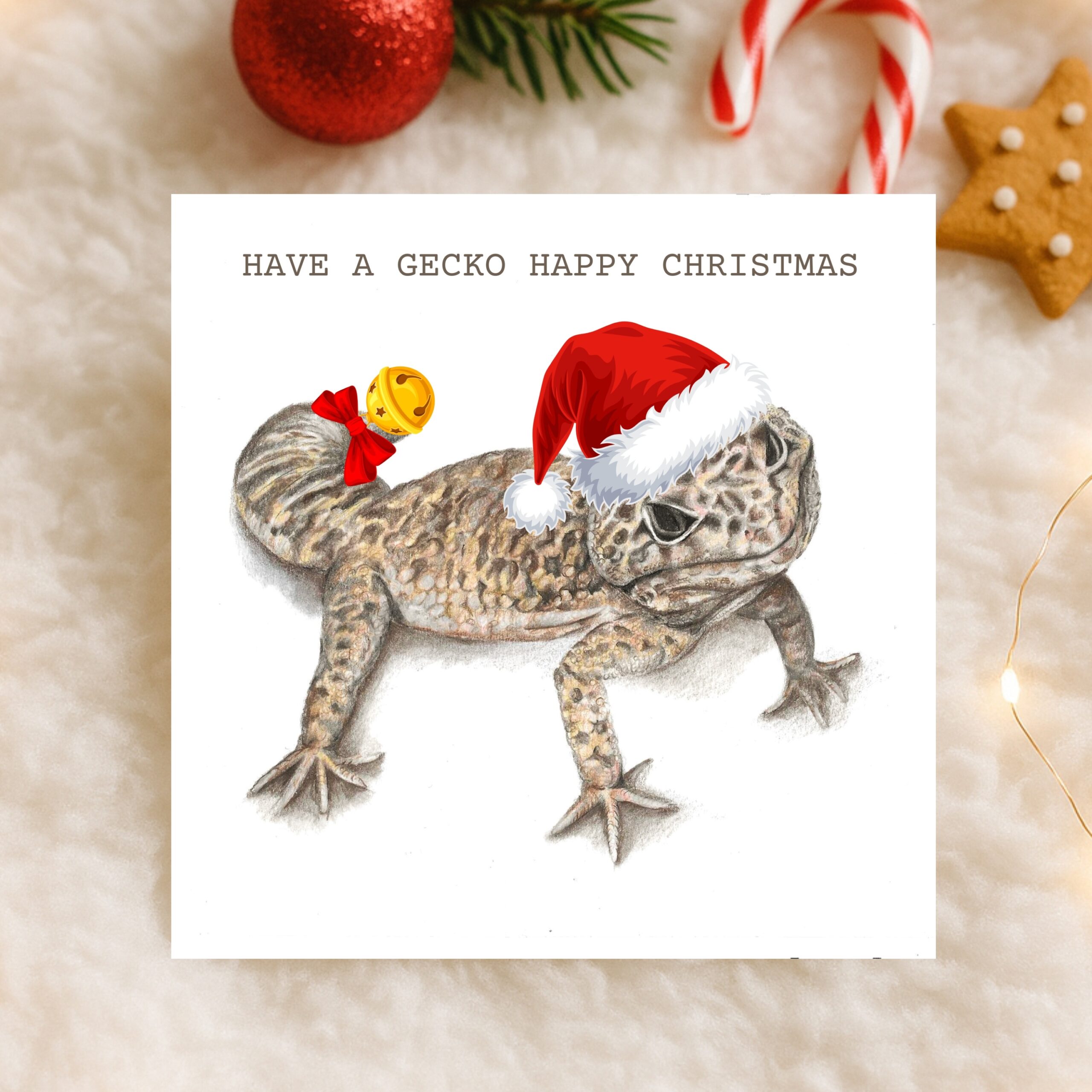 Leopard Gecko Christmas Card on a white background