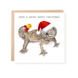 Colour pencil drawing of a Leopard gecko with Santa hat and bell on a greetings card with brown envelope